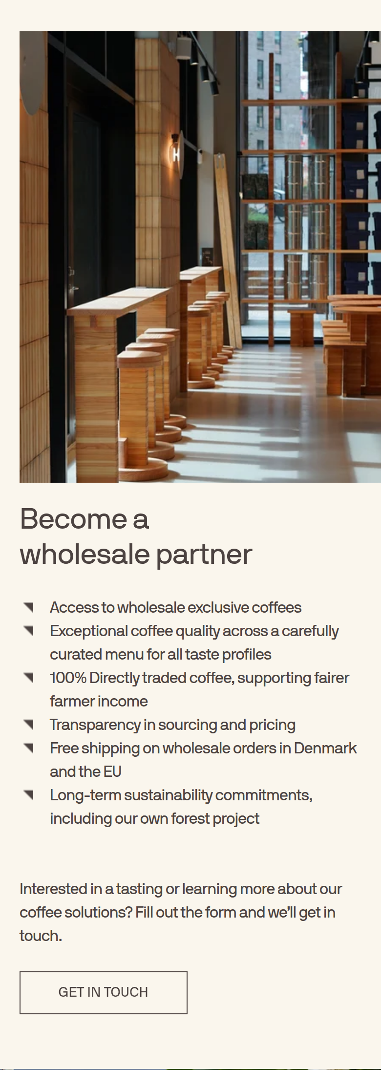 Become a Wholesale Partner section from Coffee Collective, on a phone